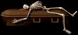 Skeleton on a coffin