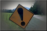 Road sign with exclamation point
