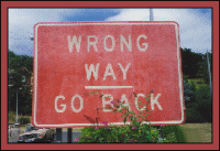 Road sign that says wrong way, go back
