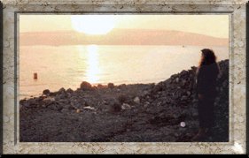 Me watching the sun rise at the Sea of Galilee